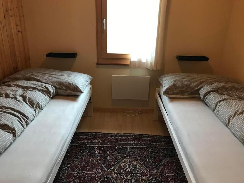 Postel nebo postele na pokoji v ubytování Soldanella