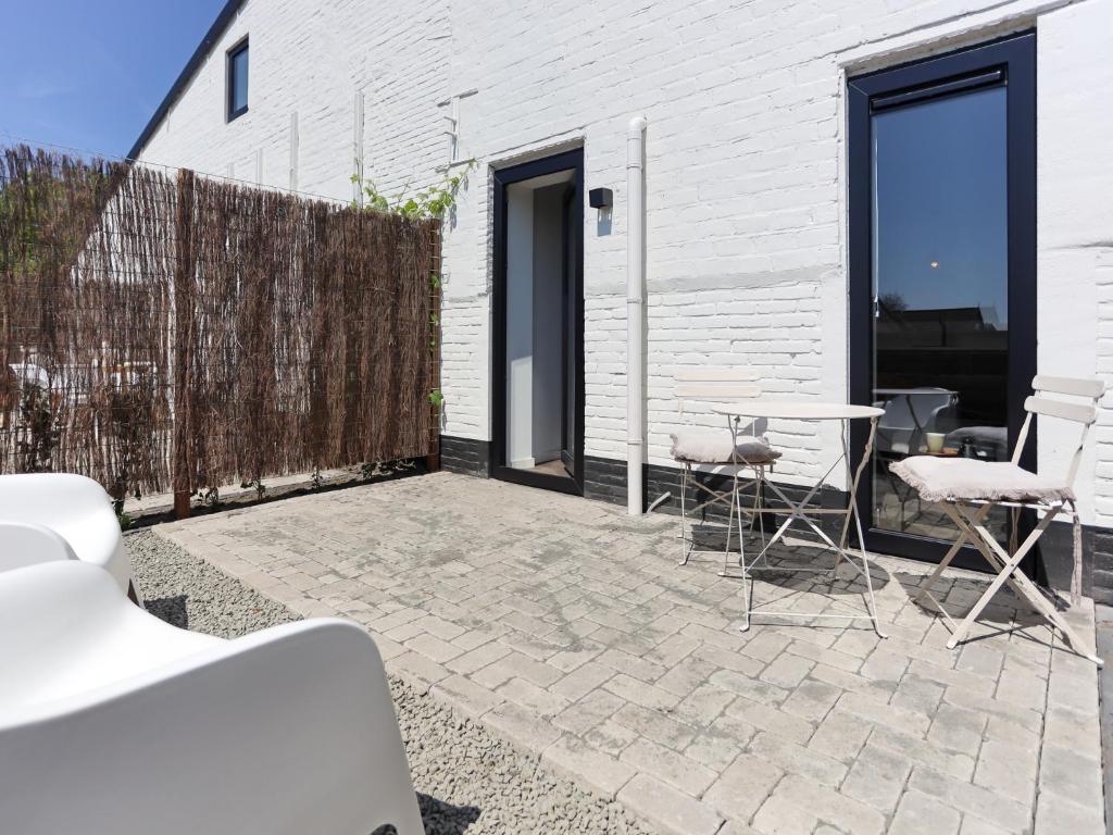 Patio nebo venkovní prostory v ubytování Modern Suite Near Beach