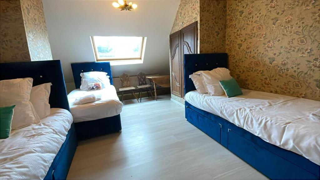 Postel nebo postele na pokoji v ubytování Villa prestige à Pfaffenhoffen