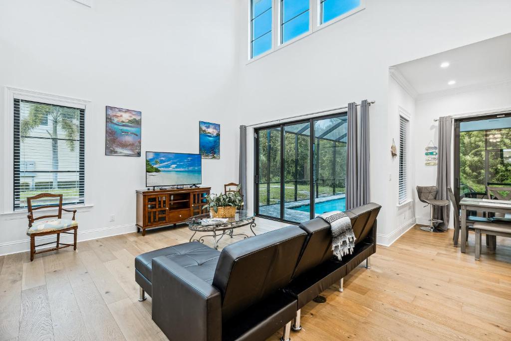 a living room with a couch and a table at 140 Ocean Estates Dr in Lakewood Park