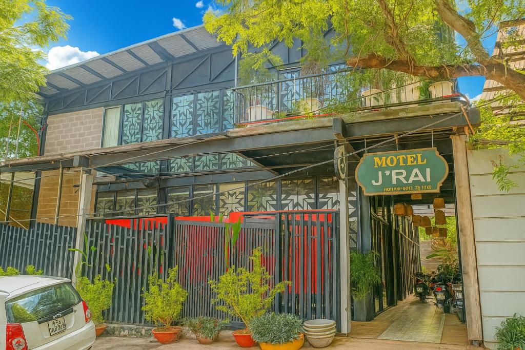 a building with a sign that reads motel rival at Jrai Homestay in Pleiku