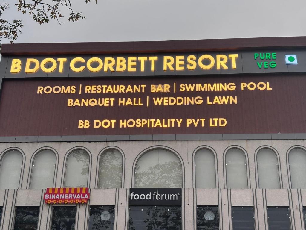 a building with a sign on the top of it at B Dot in Gaushala