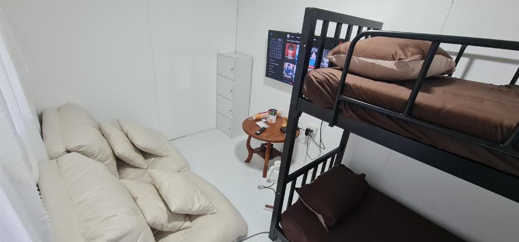 Ένα ή περισσότερα κρεβάτια σε δωμάτιο στο Terra House