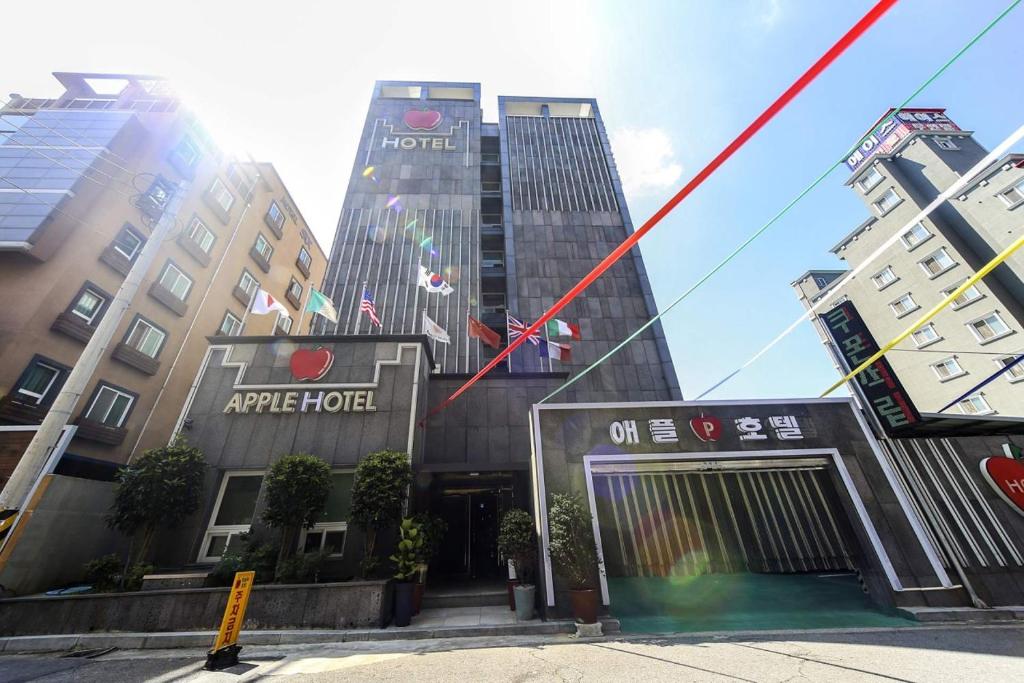 a group of tall buildings in a city at Yeosu Apple Hotel in Musŏn