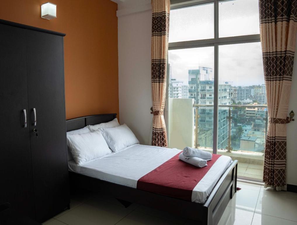 Ένα ή περισσότερα κρεβάτια σε δωμάτιο στο Azure Horizon Wellawatha by Tequila Holidays