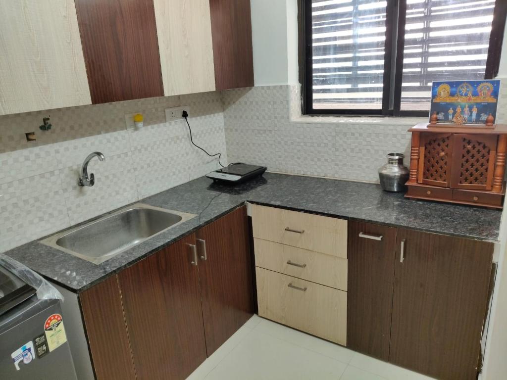 Köök või kööginurk majutusasutuses Home Stay in Puzhal