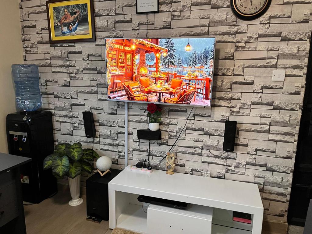 TV a/nebo společenská místnost v ubytování Casa Stays