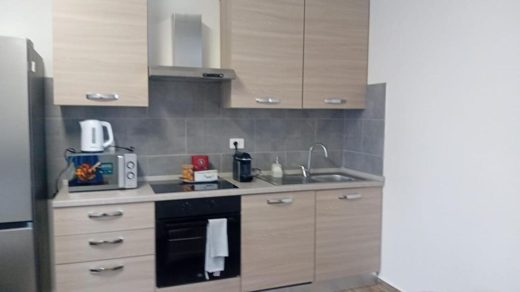 Kuchyň nebo kuchyňský kout v ubytování Corte Malpensa due