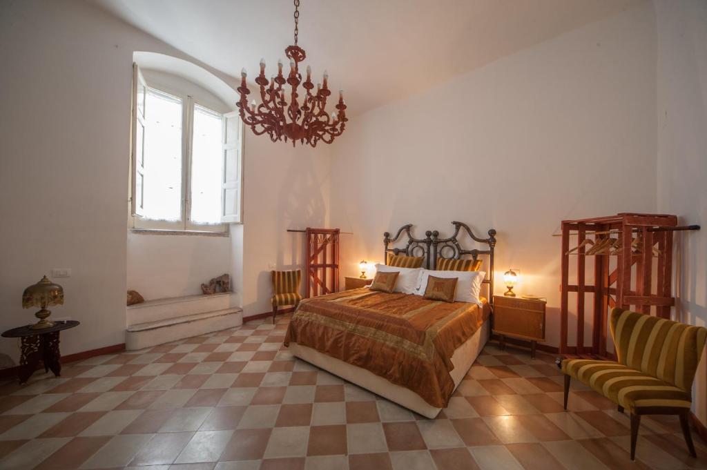 Postel nebo postele na pokoji v ubytování Suite San Giorgio