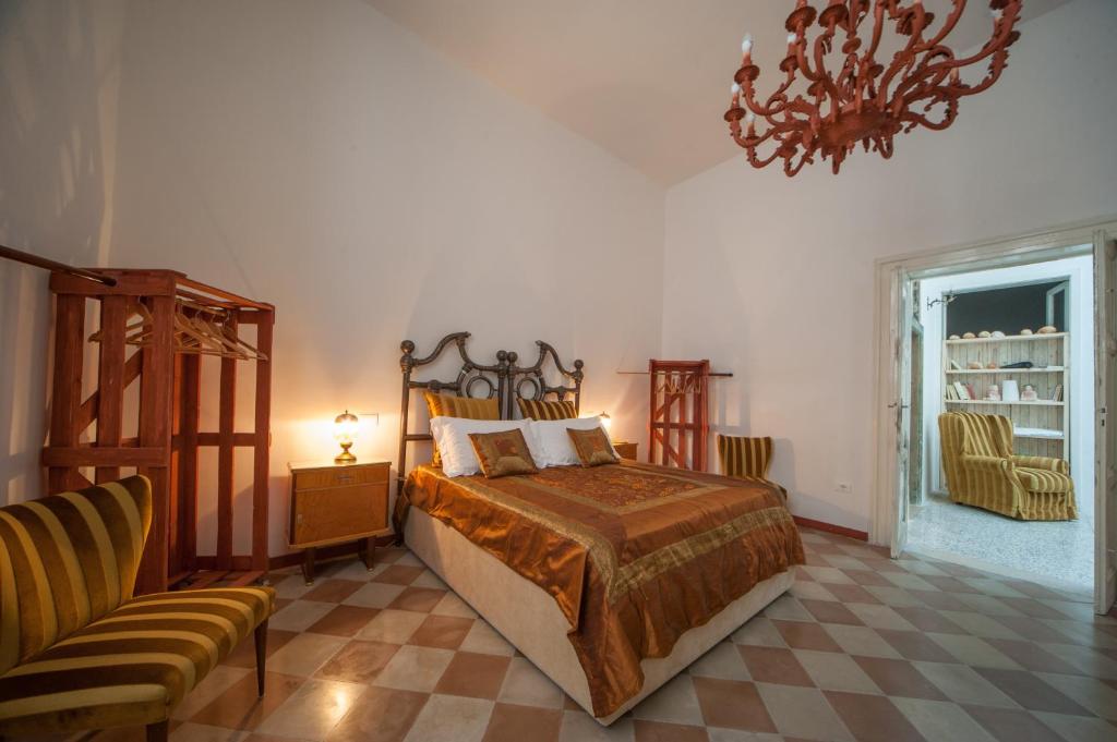 Postel nebo postele na pokoji v ubytování Suite San Giorgio