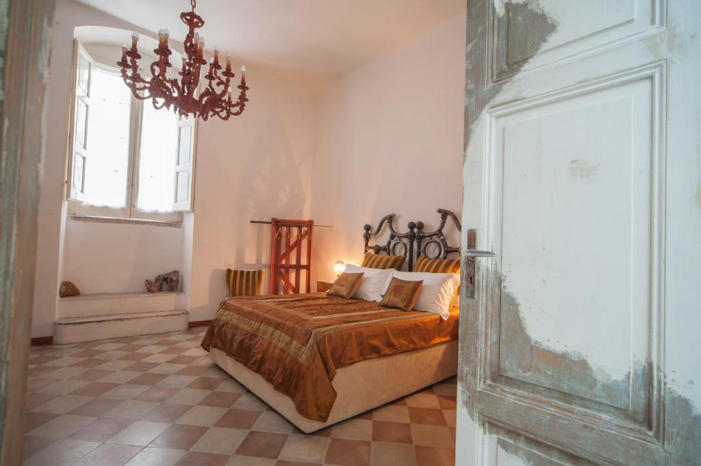 Postel nebo postele na pokoji v ubytování Suite San Giorgio