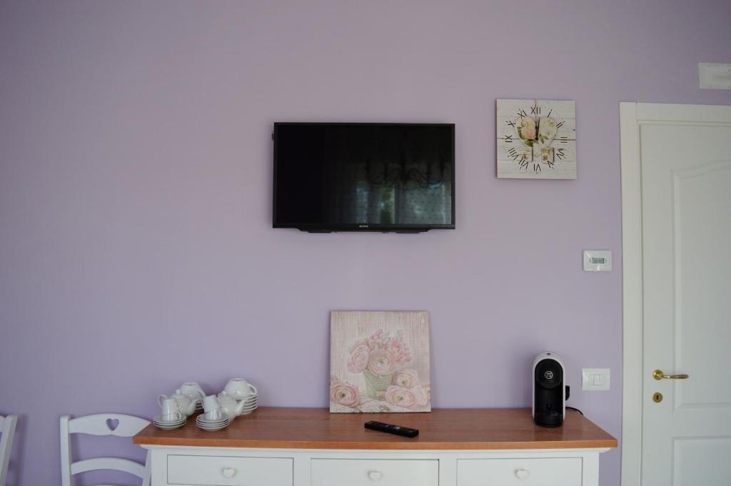 TV a/nebo společenská místnost v ubytování B&B Harmonia