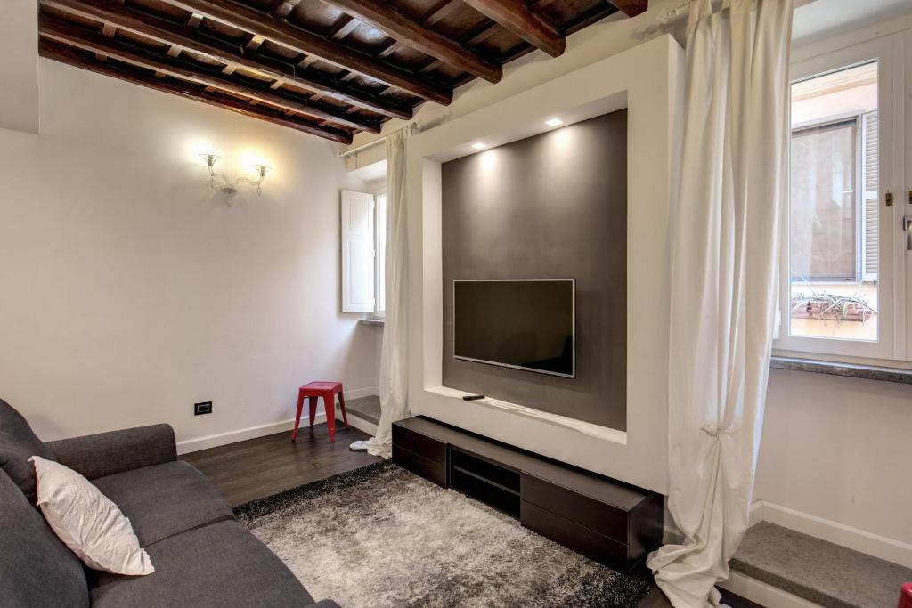 A television and/or entertainment centre at Campo de' Fiori Stylish White