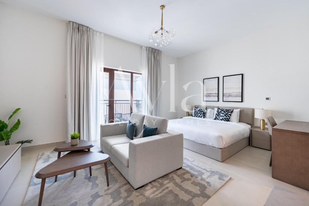 Postel nebo postele na pokoji v ubytování The Yas Luxe Escape Studio On Yas Island By Ayla