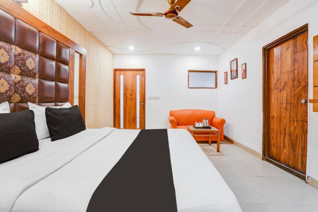 Ένα ή περισσότερα κρεβάτια σε δωμάτιο στο Hotel AD Residency