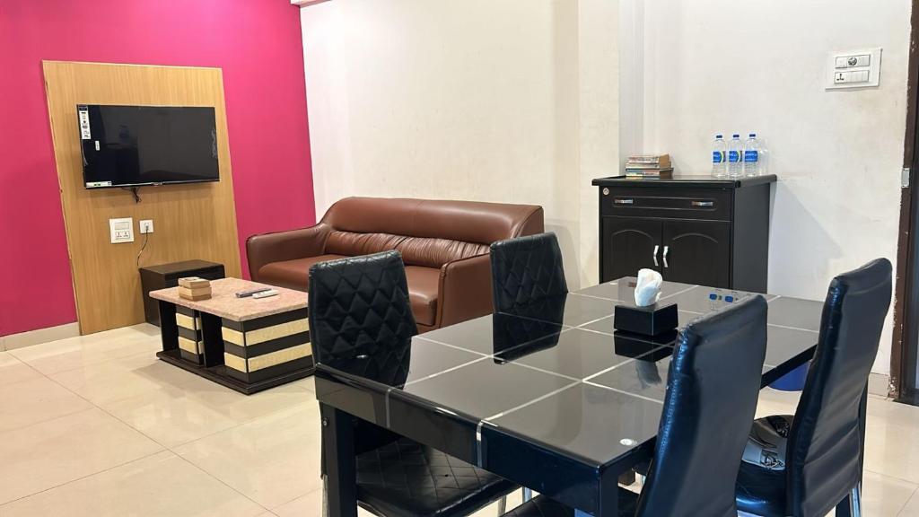 Μια τηλεόραση ή/και κέντρο ψυχαγωγίας στο Vista Vagator Junction by Dia Hotels and Homes