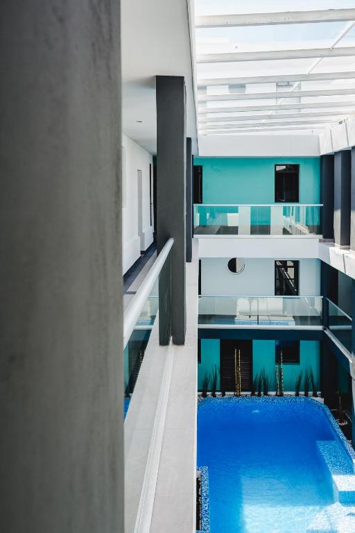 Bazén v ubytování Hotel Flamingo Merida nebo v jeho okolí