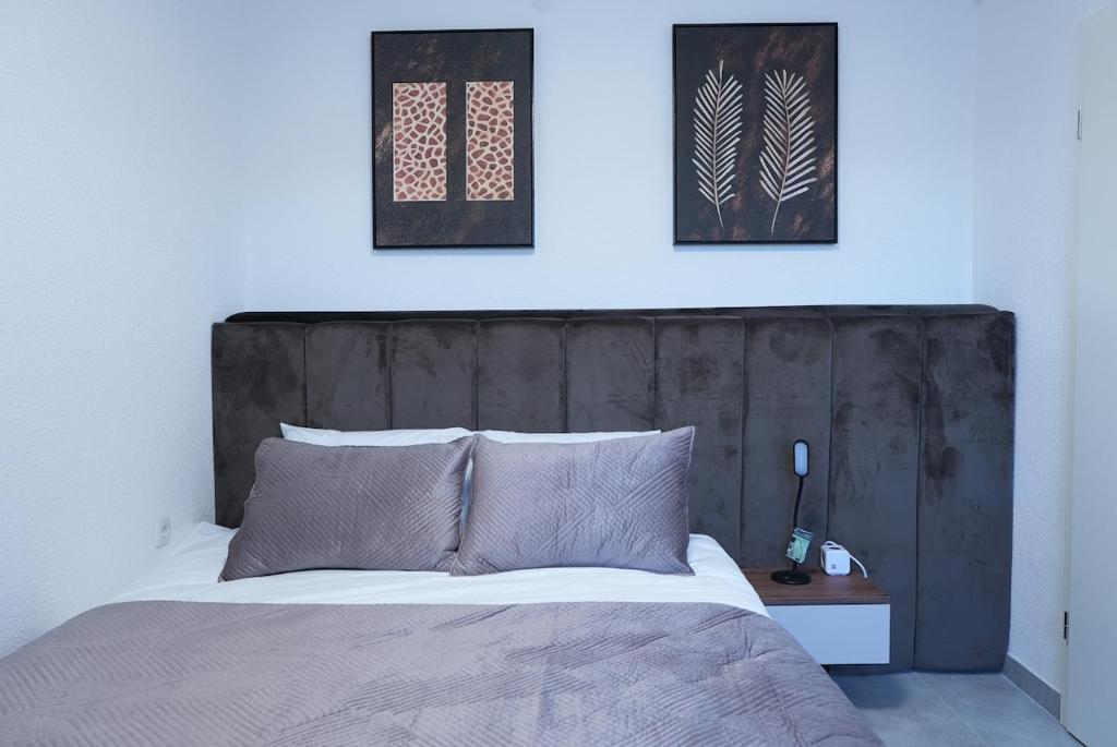 Postel nebo postele na pokoji v ubytování Wohnung IA - Modernes Twin-Apartment