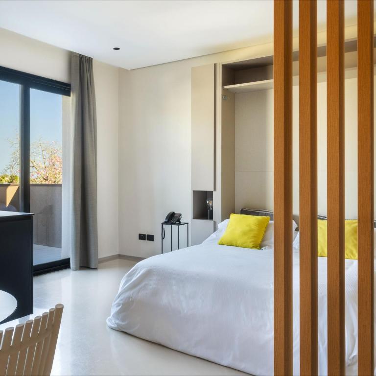 En eller flere senge i et værelse på Elegant accommodation in Catania-Beahost