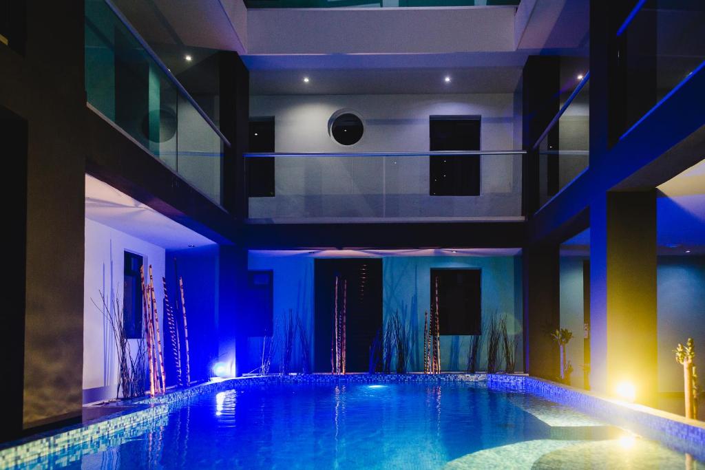 Bazén v ubytování Hotel Flamingo Merida nebo v jeho okolí