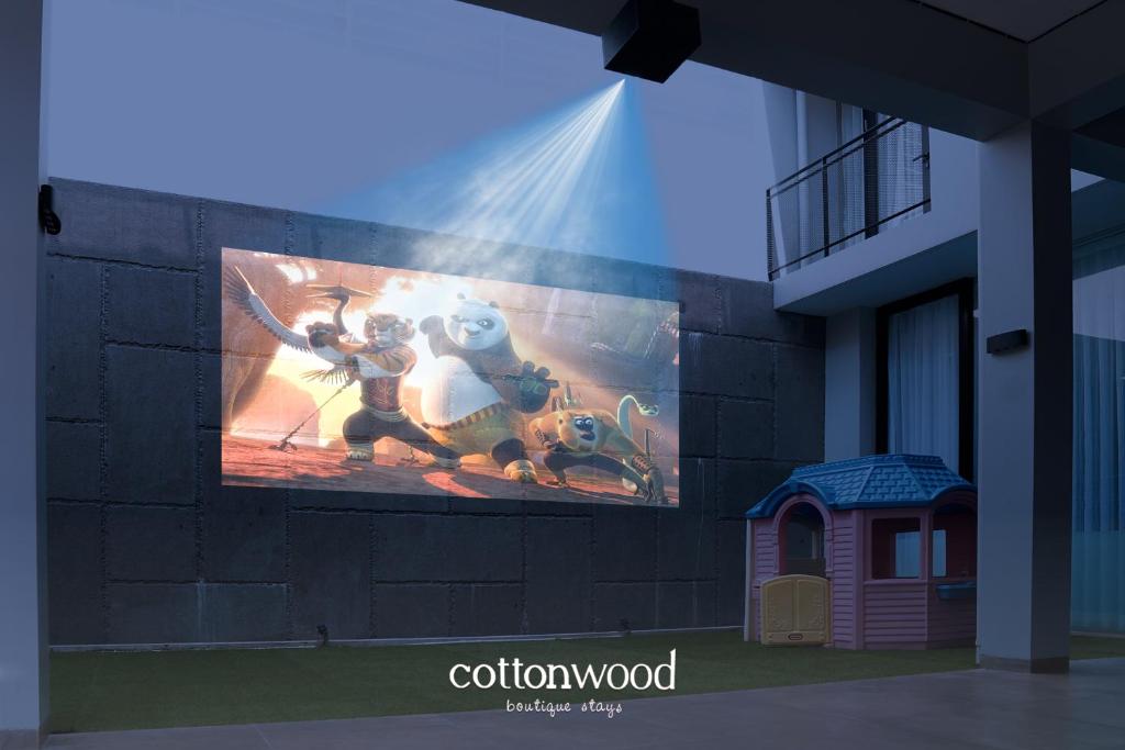 TV/Unterhaltungsangebot in der Unterkunft Cottonwood Villa Pavana - Heated pool Fitness LayarTancep200inch