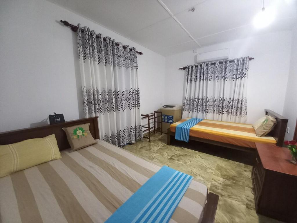 Ένα ή περισσότερα κρεβάτια σε δωμάτιο στο No-37 Home