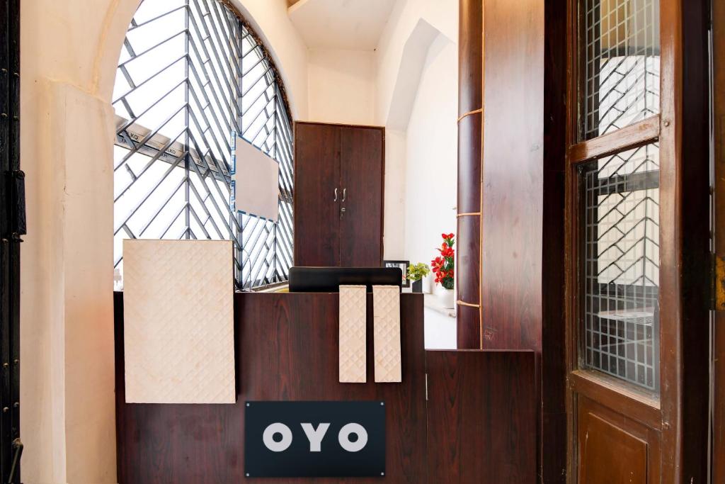 an entrance to a room with an open door at Hotel O Avenue Villa in Dum Dum