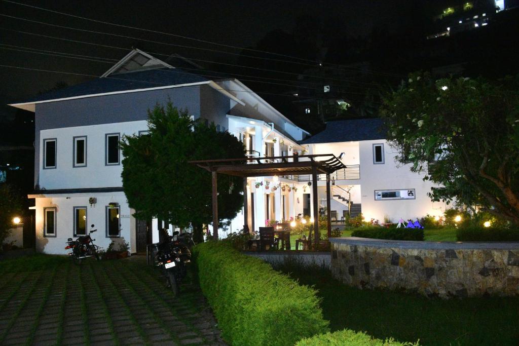 Κήπος έξω από το Magizham Homestay