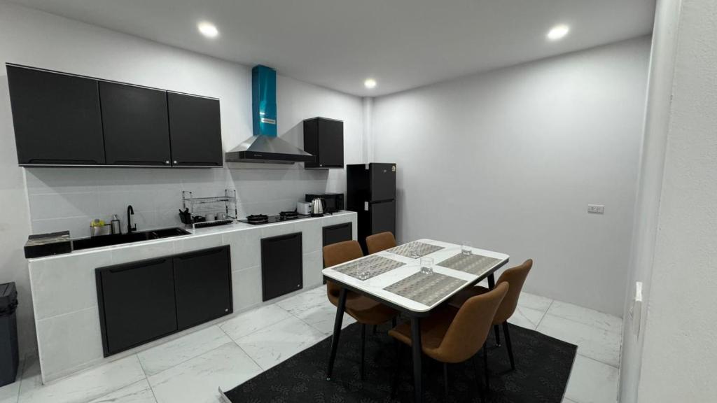 Kuchyň nebo kuchyňský kout v ubytování Bang Jo Garden Home