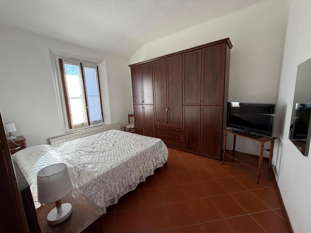 Postel nebo postele na pokoji v ubytování Molinella Appartamento Amelia & Carlo