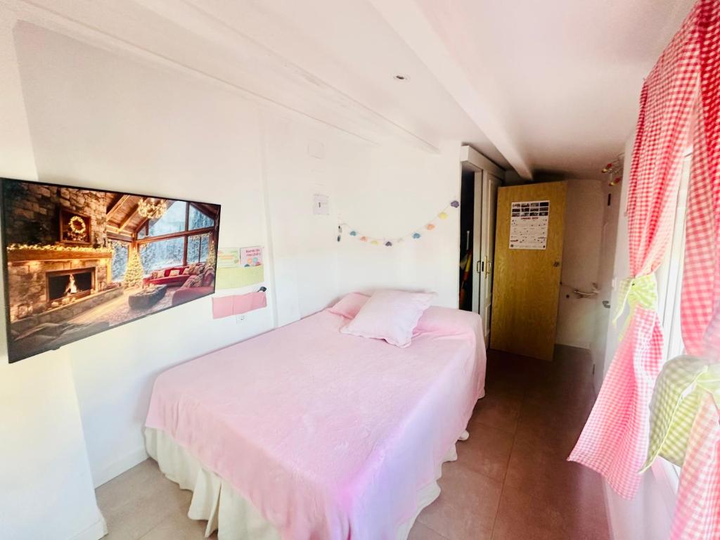 Postel nebo postele na pokoji v ubytování Habitación con baño y cocina