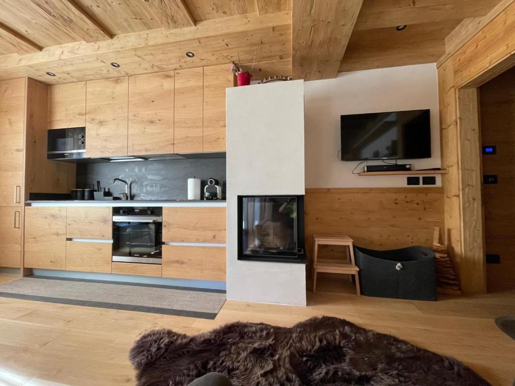 Kuchyň nebo kuchyňský kout v ubytování Nido delle Dolomiti