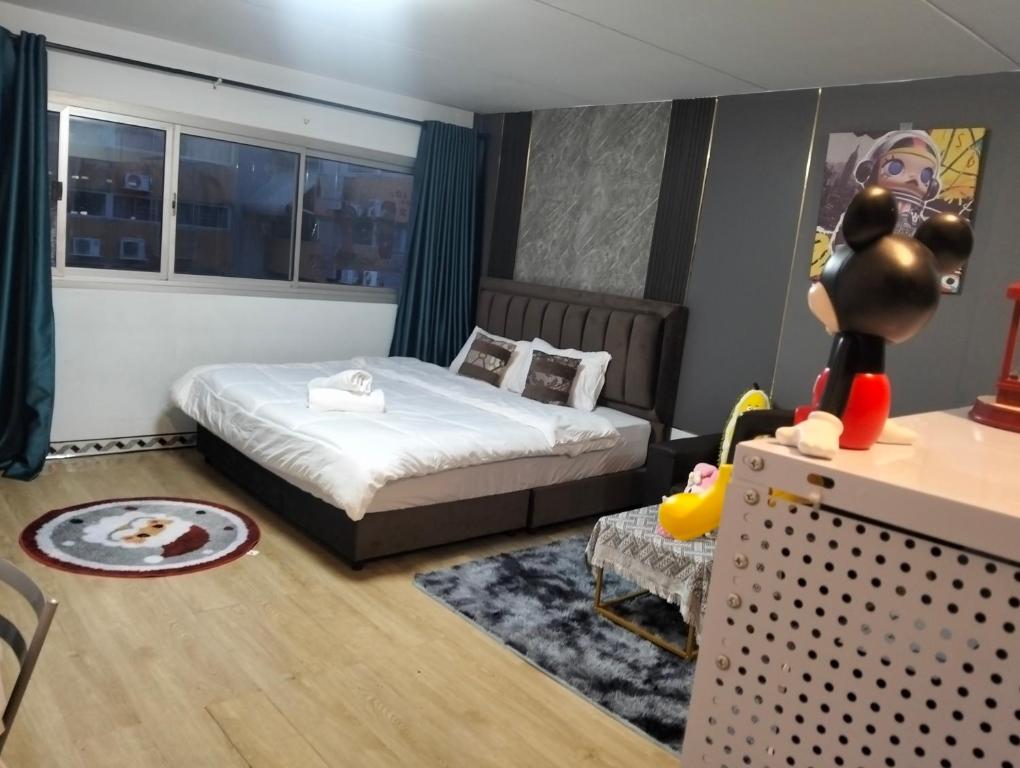 Postel nebo postele na pokoji v ubytování อิมแพ็ค popular condo c5 แม่ตังค์