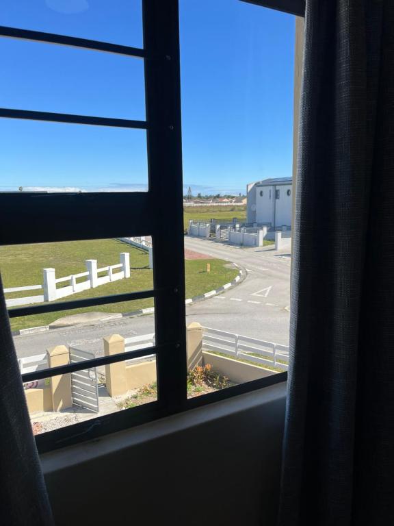 a view of a street from a window at 101 Maia in Gqeberha
