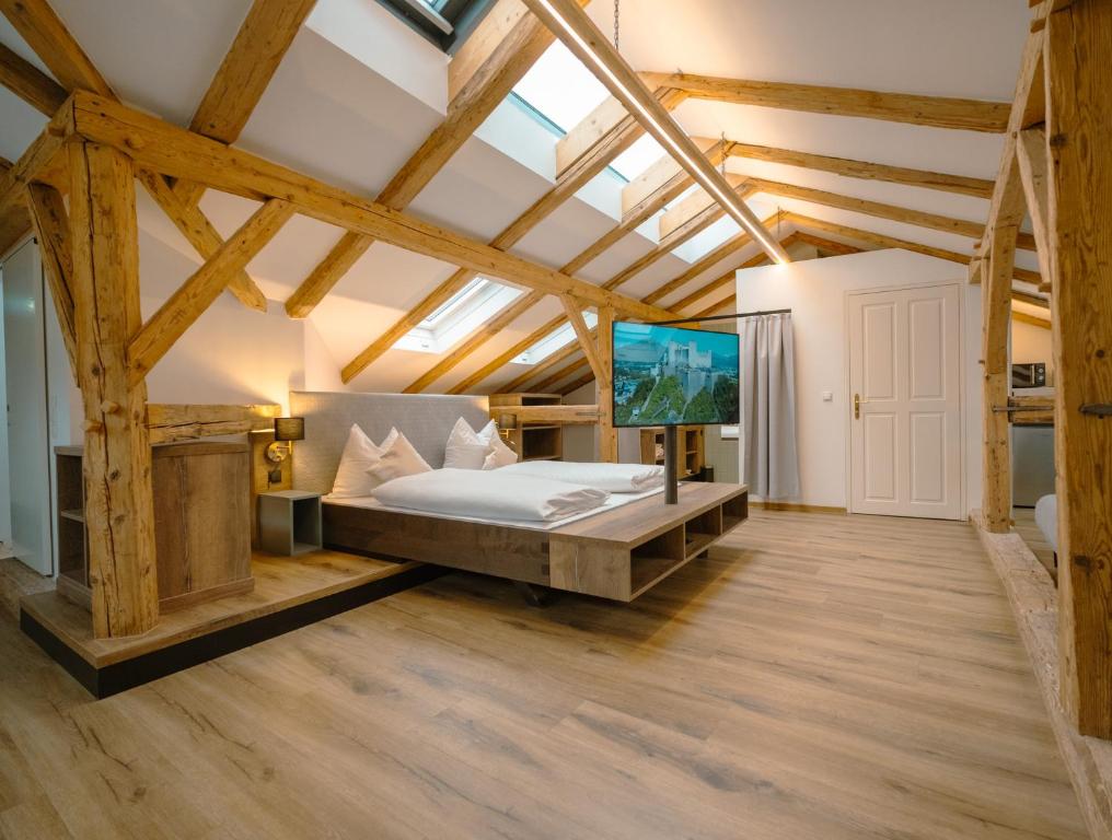 Ένα ή περισσότερα κρεβάτια σε δωμάτιο στο Apartments Salzburg - Bergstraße