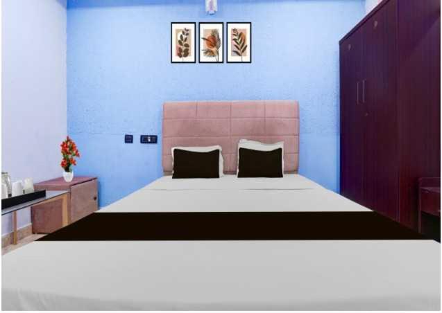 Ένα ή περισσότερα κρεβάτια σε δωμάτιο στο Collection O Mappedu Chennai Formerly Nitas Business Hotel