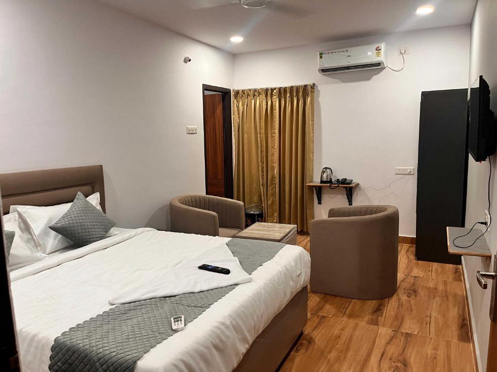 Μια τηλεόραση ή/και κέντρο ψυχαγωγίας στο Townhouse Financial District Circle Hyderabad