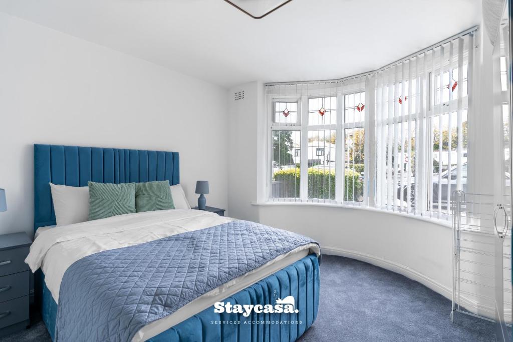 Postel nebo postele na pokoji v ubytování Spacious 4-bed Home Near Didsbury