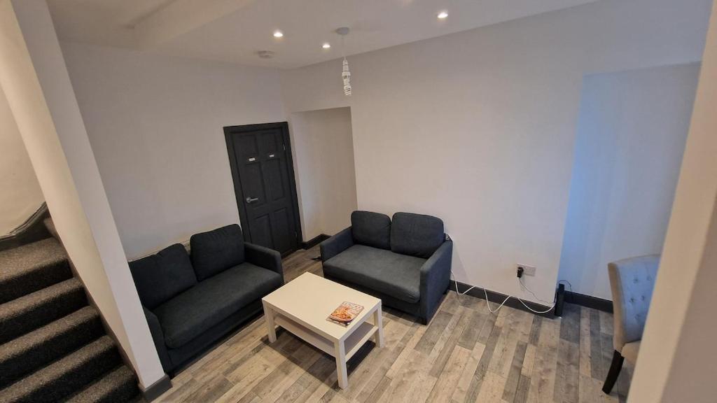 Χώρος καθιστικού στο Bed and Blue by the Beach