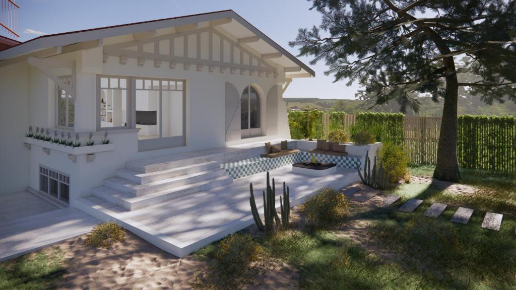 ein kleines weißes Haus in der Unterkunft Villa d'architecte avec piscine et plage à pied in La Teste-de-Buch