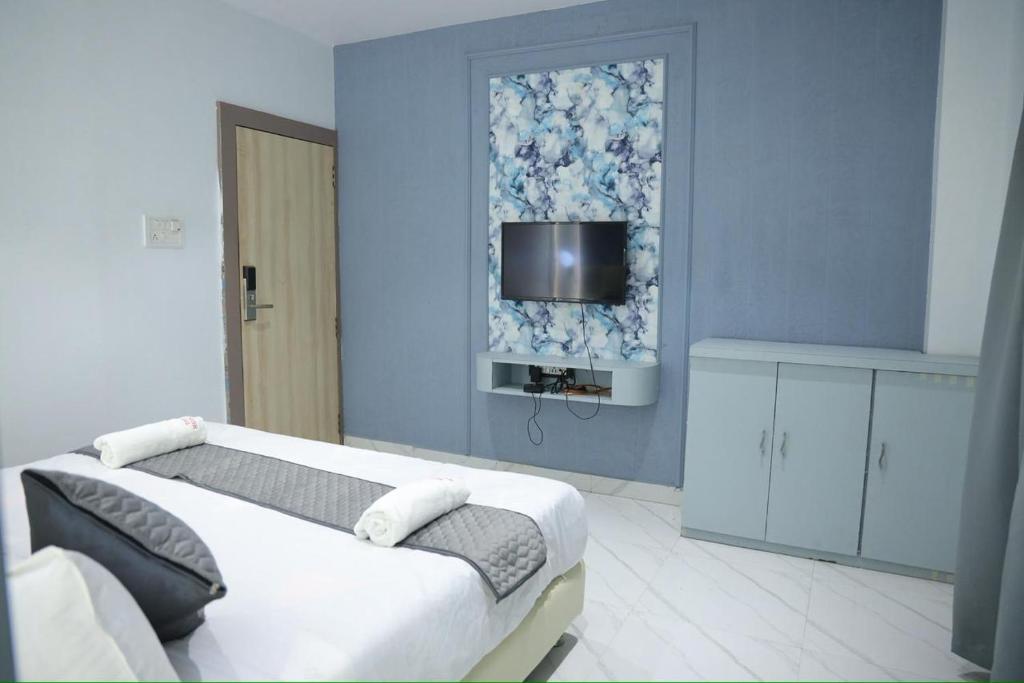 TV a/nebo společenská místnost v ubytování The rudra heritage