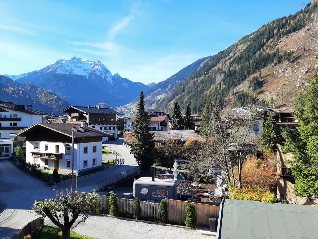 a view of a town with mountains in the background at Boardwalk center in Mayrhofen