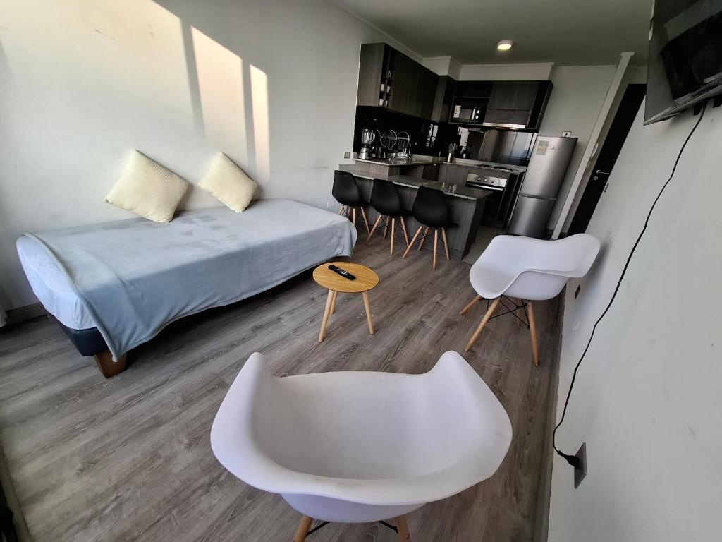 Кухня или мини-кухня в Alojamiento moderno y bien conectado a pasos del Metro y centros urbanos
