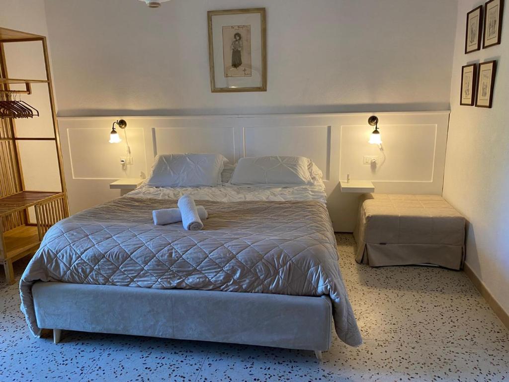 Ένα ή περισσότερα κρεβάτια σε δωμάτιο στο Villa Raffaele