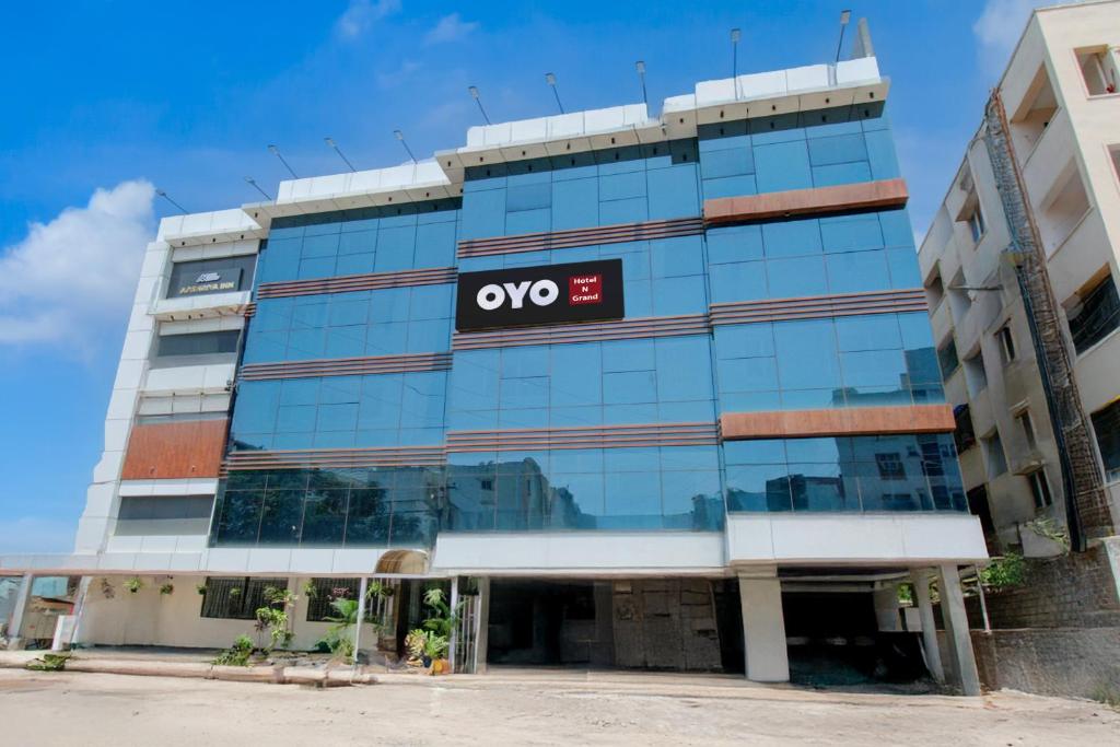 an office building with an ovo sign on it at Hotel O N Grand in Hyderabad