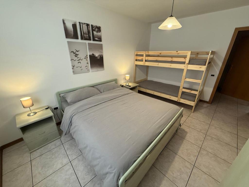 Postel nebo postele na pokoji v ubytování Il Raponzolo di Roccia