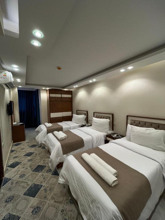 Postel nebo postele na pokoji v ubytování City Sun Cairo Hotel
