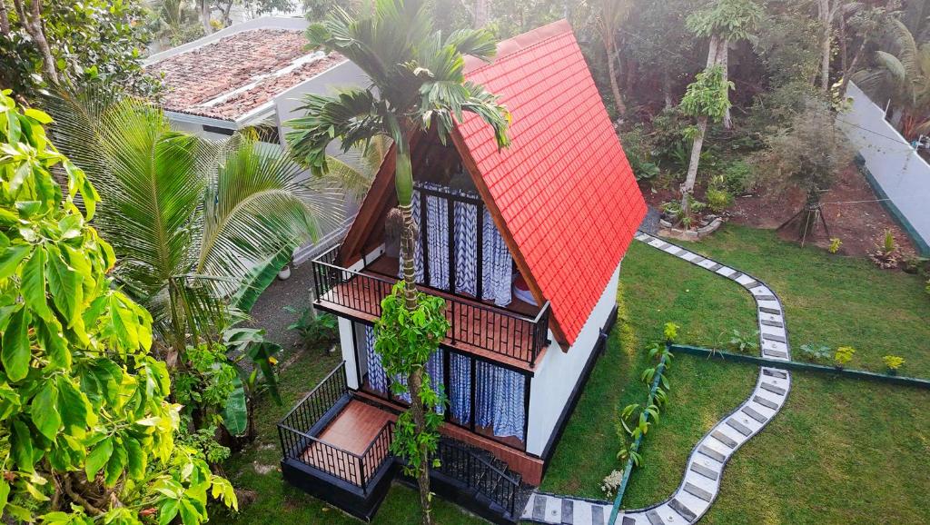 an aerial view of a house with a red roof at Shenu Villa in Talpe