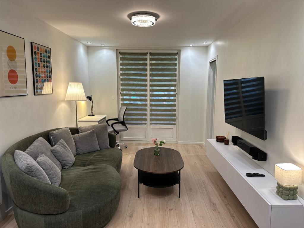 Posezení v ubytování Havre de paix en ville - chez Céline