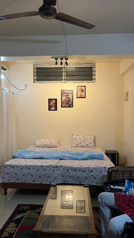 Ένα ή περισσότερα κρεβάτια σε δωμάτιο στο Mannat